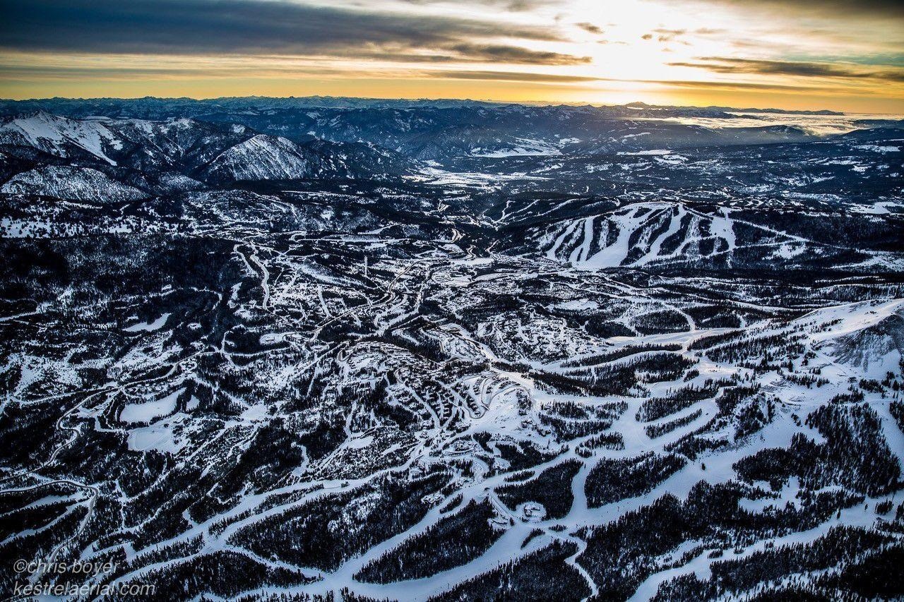 Chris Boyer's aerial photo is worth a thousand words. It's impossible to ignore the obliteration of once-exceptional wildlife habitat that existed in Big Sky, Montana before industrial strength outdoor recreation and billions of dollars' worth of real estate were carved into the valley enwrapping Lone Mountain. Steadily, wildlife have been displaced in Big Sky and it is exacting huge negative spillover effects on adjacent public lands. Today, only upper class people can afford to buy property in Big Sky. Were a real-estate transfer tax in place, a large sum could be generated for conservation to buffer nature from the resort community's ballooning negative impacts. Photo courtesy Christopher Boyer. To see more of his collectible photographs go to kestrelaerial.com
