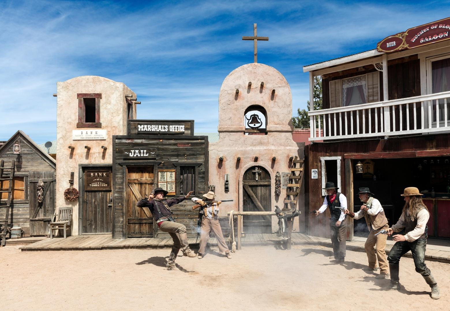 In the American West, mythology and stereotypes are still perpetuated through spaghetti western films and mock shootouts such as this one in Old Tombstone in southeast Arizona. Journalism must follow certain tenets, and exists to debunk myth. Creative Commons photo