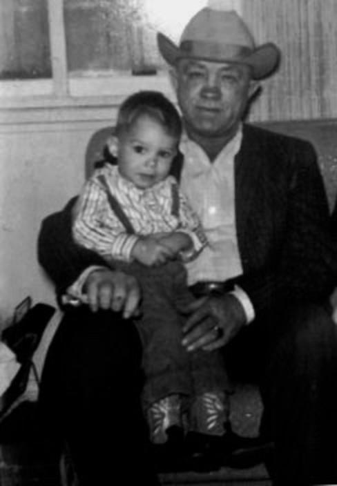 Rowland and his granddad. Grainy photographs can provide tactile grist for fine writing and stories of true grit.