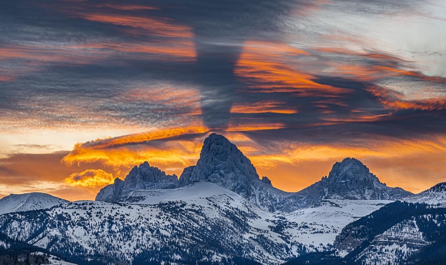 These crepuscular rays are caused by the backlit mountains casting shadows at sunrise and sunset. I have only seen them a handful of times and it felt miraculous to see them from my home on the “quiet side” of the Tetons. Photo by Howie Garber