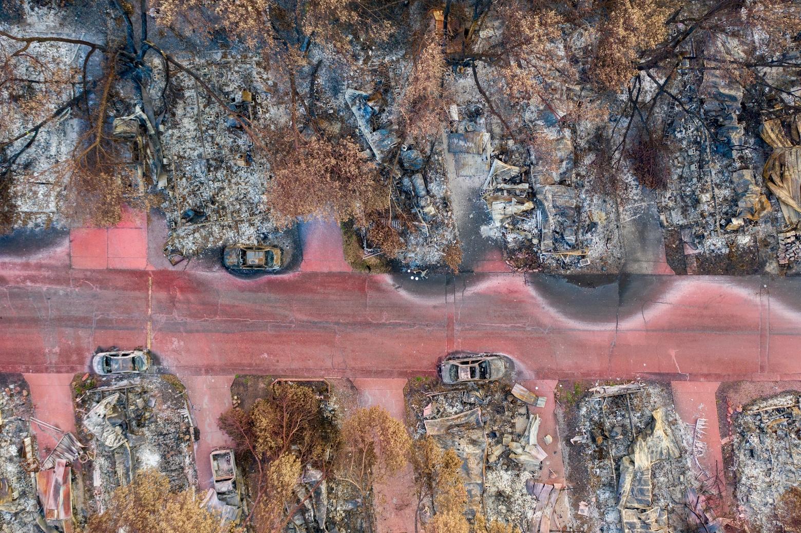 Aerial view of a burned down community and vehicles in southern Oregon where the 2020 Almeda Fire reached a WUI subdivision few thought would ever be destroyed by wildfire.  Photo courtesy Shutterstock ID 1829602370