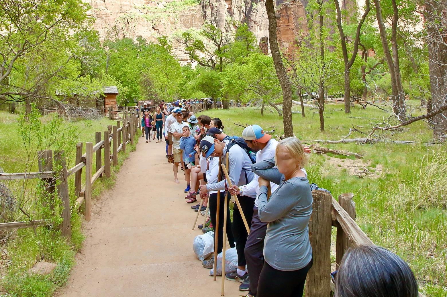 Visitors to Zion National Park wait in line to catch a shuttle bus, one of the tools the park uses to get people out of their cars in order to alleviate traffic congestion. With a lot of federal investment being made in public land infrastructure, will it result in more crowding or less and what will be the consequences for wildlife?  Here's also a major difference between how hunters/anglers and outdoor recreationists approach the backcountry. Hunters and anglers do not like having a lot of people in the areas where they hunt and fish; non-hunting outdoor recreationists, meanwhile, seem to have a much higher tolerance for playing amid crowds of people.  Photo courtesy Shutterstock ID 1973723012