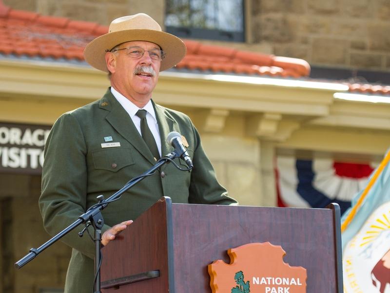 Former Superintendent Dan Wenk speaking at the Albright Visitor Center in Yellowstone National Park