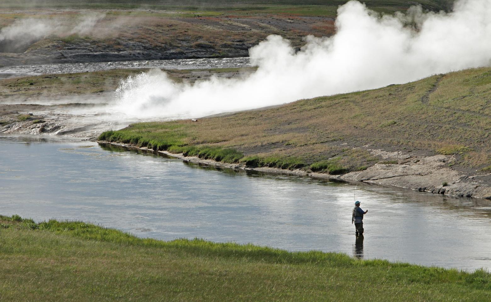 The Firehole River, along with the Gibbon and Madison rivers in Yellowstone National Park, has been placed under hoot-owl restrictions to alleviate stress and pressure on fish. Photo by Jim Peaco/NPS