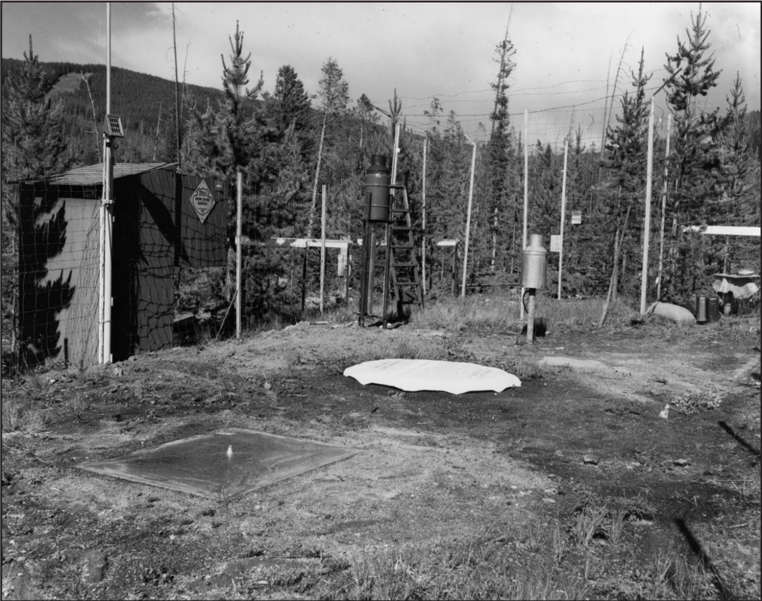 Testing metal and butyl snow pillows at Lick Creek, south of Bozeman, Montana, one of the earliest SNOTEL sites in the country. Photo courtesy NRCS