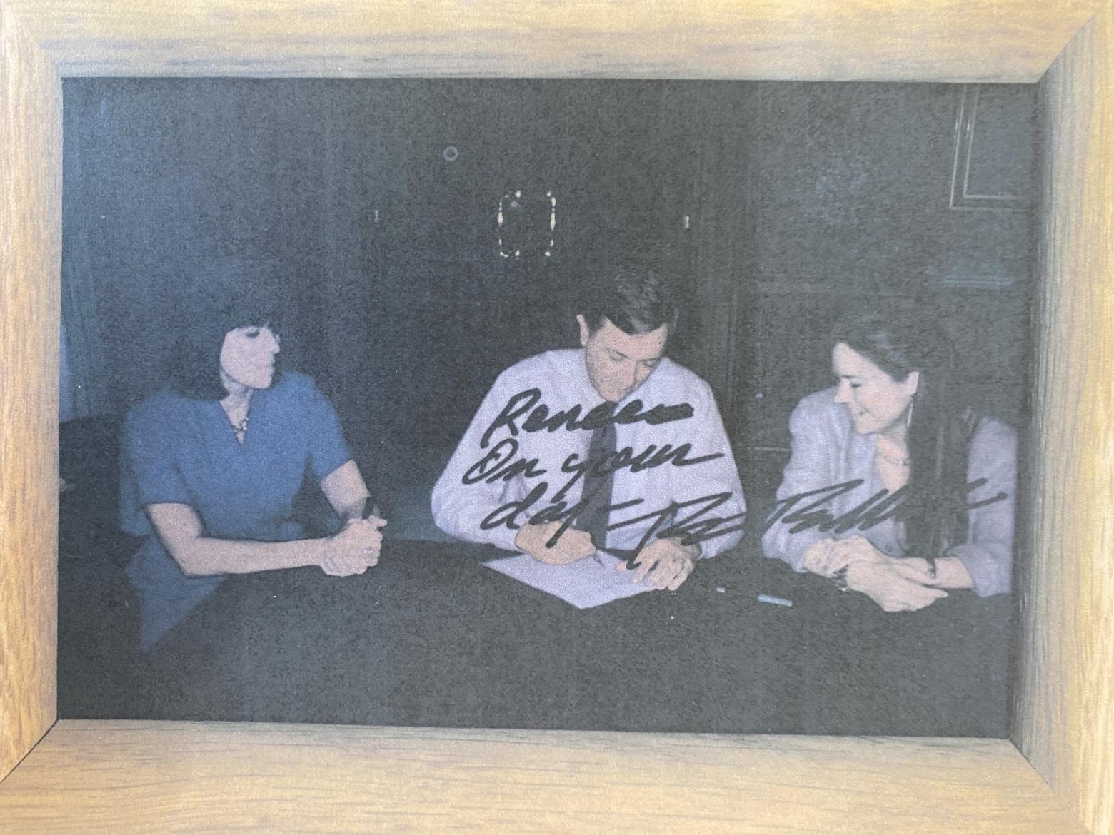 U.S. Interior Secretary Bruce Babbitt signs the record of decision allowing for the reintroduction of wolves to Yellowstone National Park and central Idaho. He’s flanked by wolf activist Renee Askins, right, and Mollie Beattie, then director of the U.S. Fish and Wildlife Service. Courtesy photo