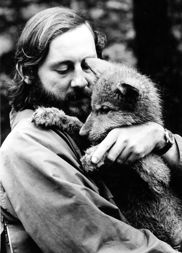 Wildlife biologist Paul Paquet holds a wolf pup in 1973. Photo courtesy Paul Paquet