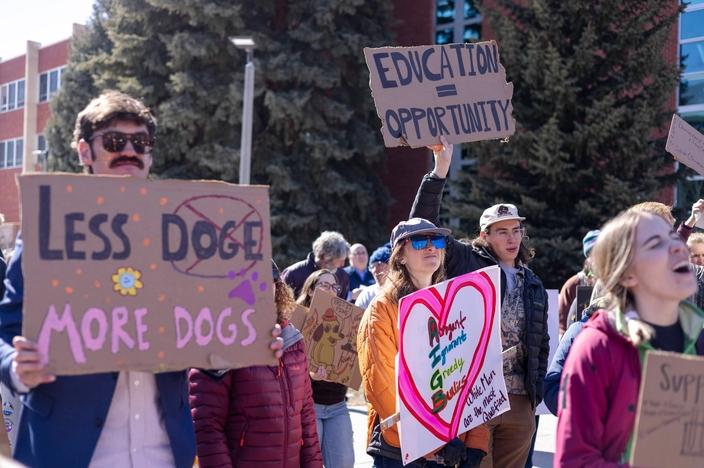 Protesters in Bozeman held signs at the rally for science on March 7. Photo by Hazel Cramer