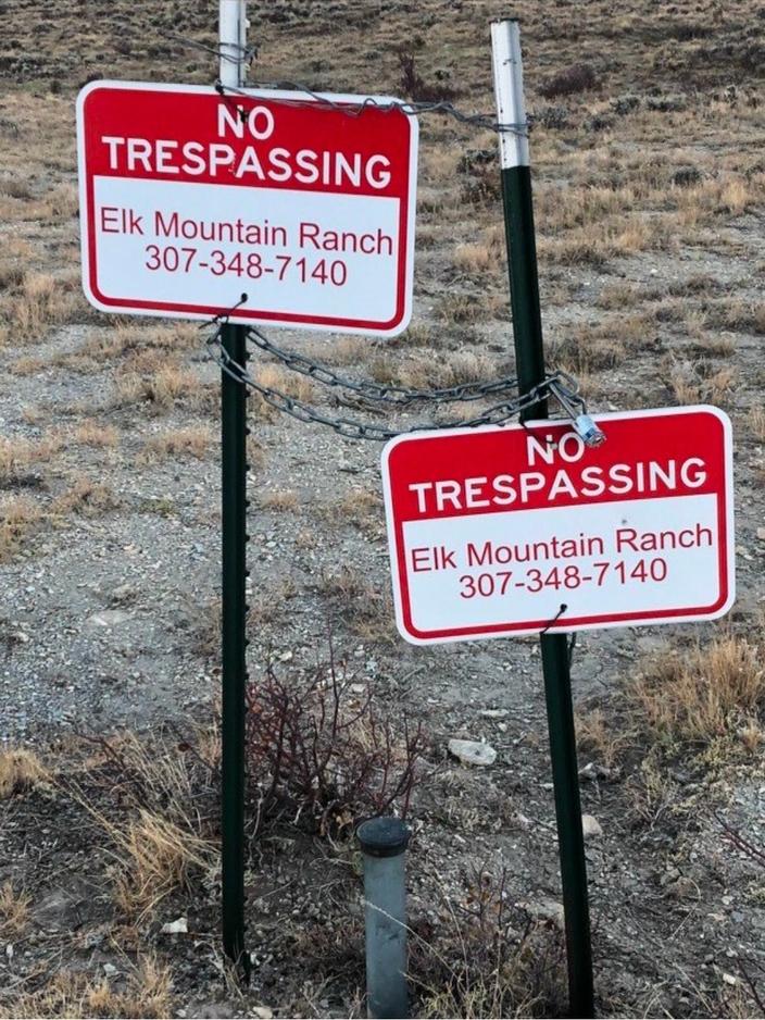 The brass cap corner marker installed by surveyors is visible in this photo of a short fence erected by Elk Mountain Ranch to deter hunters and others from entering BLM land. The photo was included in legal filings associated with a civil trespassing case. Photo from filing, U.S. Court of Appeals, Tenth Circuit