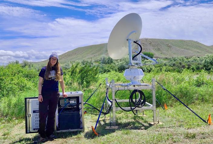 Taylor Kennedy, graduate research assistant at MSU's Entomology - Land Resources and Environmental Sciences program, at the Powell, Wyoming, radar site, June 2023. Photo courtesy Taylor Kennedy