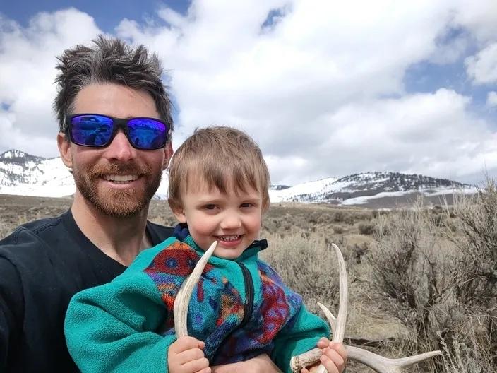 Keegan and his son, Riley Hiker David, hunting horns. Photo courtesy Keegan David