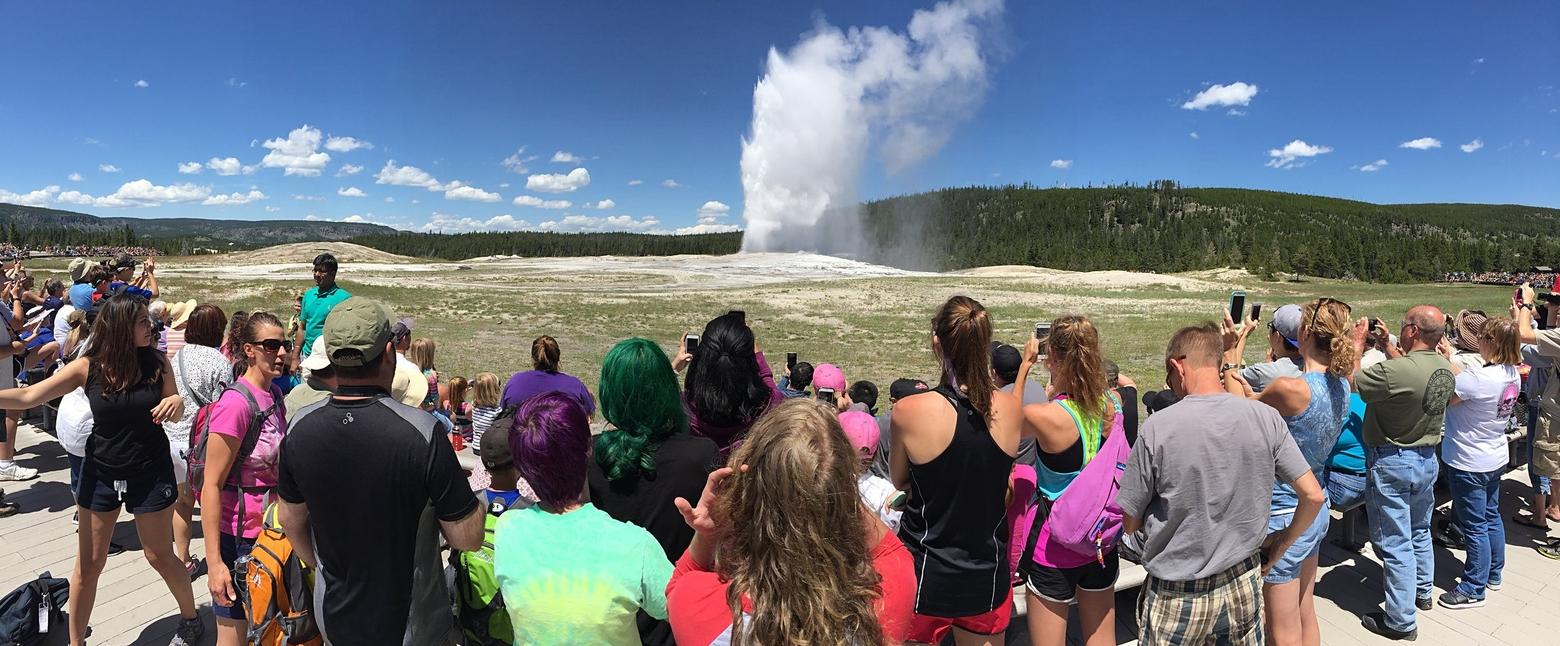Visitors take in the Old Faithful Geyser, among the top tourist attractions at Yellowstone National Park. So far in 2025, Yellowstone has already seen 762,672 visitors. Photo by Jim Peaco/NPS